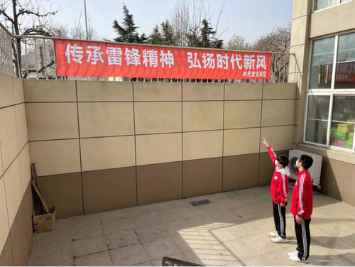 大连时代学校雷锋活动报道613.jpg